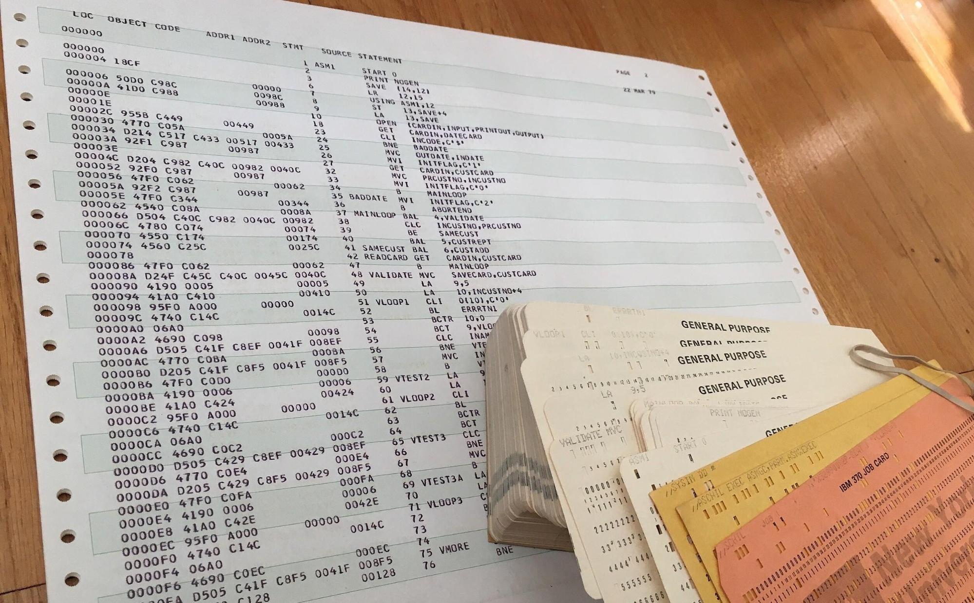IBM_keypunch_deck_and_program_listing_for_Assembly_language_student_program_at_New_York_University_1979-1.jpg